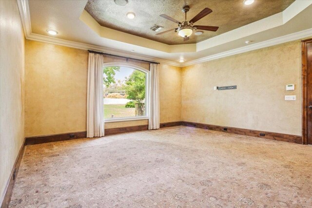 1111 Mill Creek Dr, Salado, TX 76571 - carpeted empty room featuring a tray ceiling, a ceiling fan, crown molding, and recessed lighting