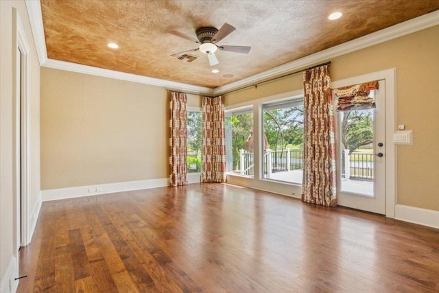 1111 Mill Creek Dr, Salado, TX 76571 - empty room with crown molding, wood finished floors, a ceiling fan, and recessed lighting
