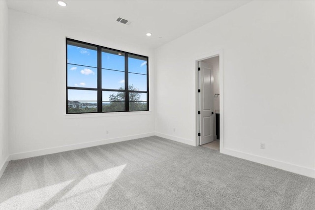 3008 Soldato Way, Leander, TX 78641 - spare room featuring light carpet and recessed lighting