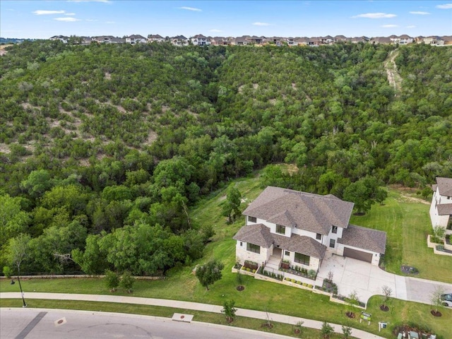 3008 Soldato Way, Leander, TX 78641 - view of subject property featuring a heavily wooded area