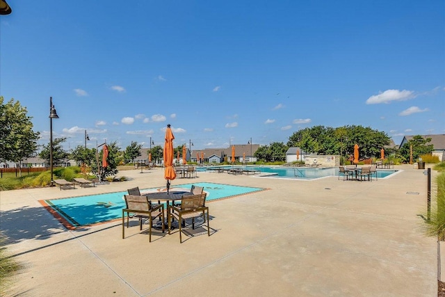 101 Wind Flower Ln, Liberty Hill, TX 78642 - community pool with a patio