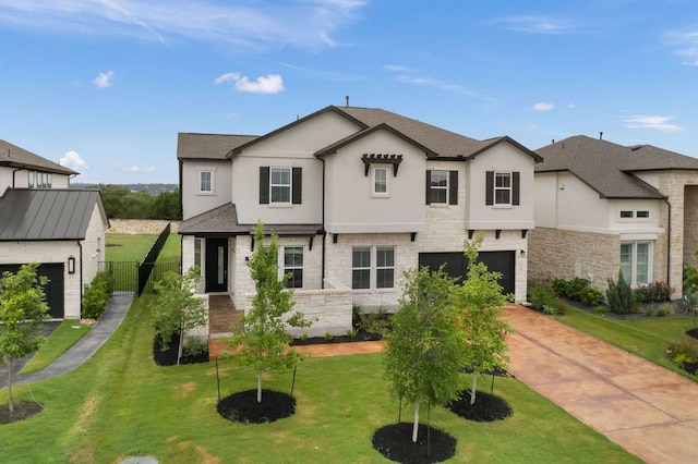 504 Tomichi Trl, Austin, TX 78738 - view of front of home with stucco siding, an attached garage, driveway, and stone siding