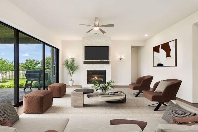 504 Tomichi Trl, Austin, TX 78738 - living room featuring a fireplace, ceiling fan, baseboards, and recessed lighting