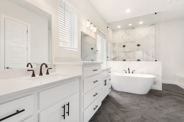 504 Tomichi Trl, Austin, TX 78738 - full bath featuring recessed lighting, a freestanding bath, vanity, and a marble finish shower