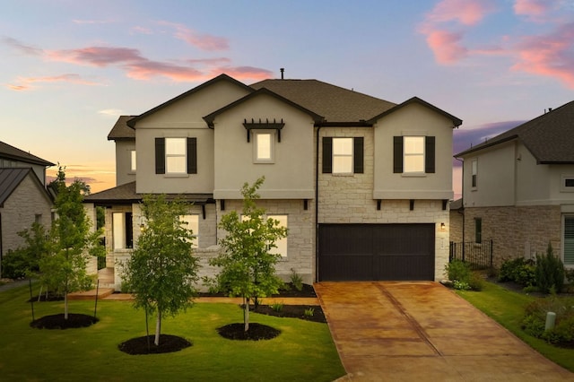 504 Tomichi Trl, Austin, TX 78738 - view of front of house featuring stone siding, stucco siding, driveway, a garage, and a shingled roof