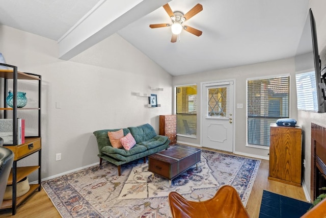 806 W 24th St Unit 302, Austin, TX 78705 - living room featuring lofted ceiling, wood finished floors, a ceiling fan, and baseboards
