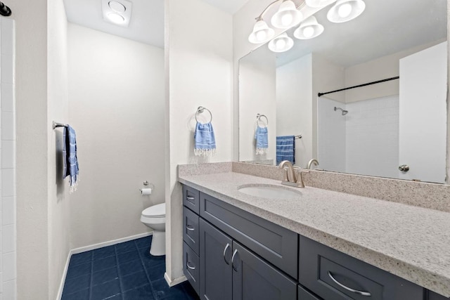 806 W 24th St Unit 302, Austin, TX 78705 - full bath featuring toilet, vanity, tile patterned flooring, a shower, and baseboards
