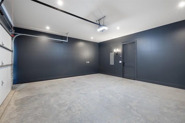 4600 Parkdale Pl Unit 1, Austin, TX 78745 - garage with a garage door opener and recessed lighting