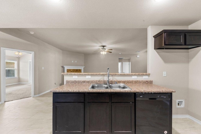 4201 Colonel Dr, Killeen, TX 76549 - kitchen with black dishwasher, ceiling fan, light countertops, dark brown cabinetry, and a textured ceiling