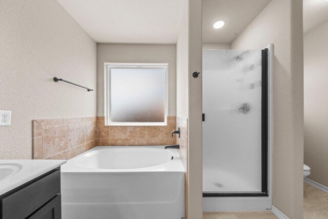 4201 Colonel Dr, Killeen, TX 76549 - full bathroom with a shower stall, a garden tub, and vanity