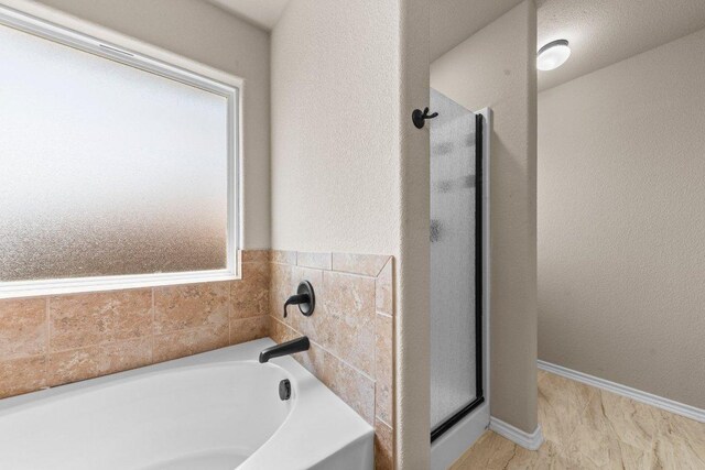 4201 Colonel Dr, Killeen, TX 76549 - full bath with a stall shower and a garden tub