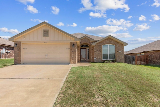4201 Colonel Dr, Killeen, TX 76549 - ranch-style house featuring brick siding, driveway, board and batten siding, and an attached garage