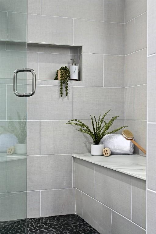 2635 Barton Hills Dr, Austin, TX 78704 - full bath featuring a stall shower