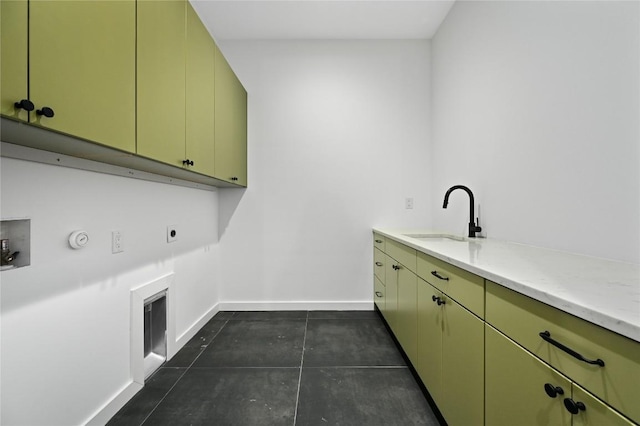 2635 Barton Hills Dr, Austin, TX 78704 - laundry area featuring cabinet space, hookup for an electric dryer, hookup for a gas dryer, and washer hookup