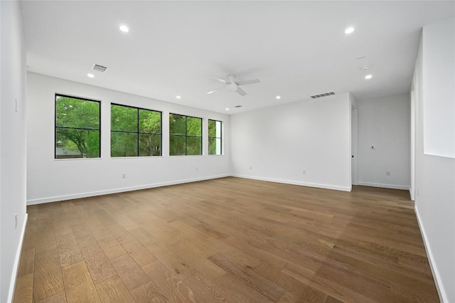 2635 Barton Hills Dr, Austin, TX 78704 - empty room with ceiling fan, wood finished floors, and recessed lighting