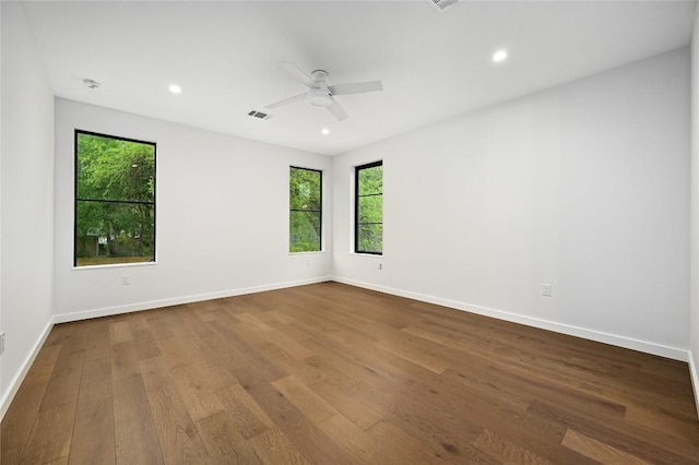 2635 Barton Hills Dr, Austin, TX 78704 - spare room with wood finished floors, a ceiling fan, and recessed lighting