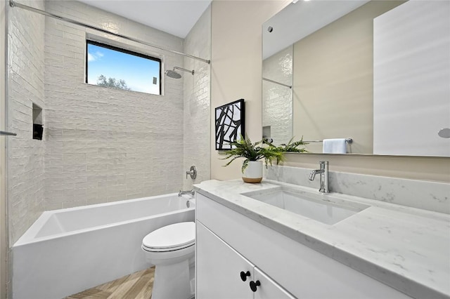 2635 Barton Hills Dr, Austin, TX 78704 - full bathroom featuring vanity, shower / washtub combination, and wood finished floors