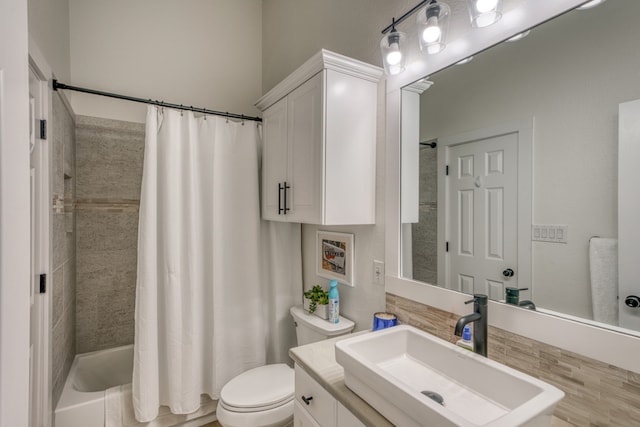 3305 Close Call, Horseshoe Bay, TX 78657 - bathroom with toilet, shower / bath combo with shower curtain, and vanity