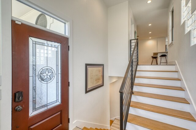 3305 Close Call, Horseshoe Bay, TX 78657 - foyer entrance with stairs, a towering ceiling, recessed lighting, and baseboards