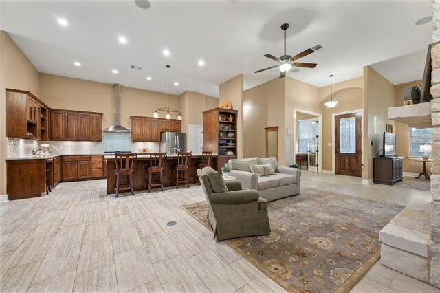 201 Greenridge Ln, Dripping Springs, TX 78620 - living room featuring high vaulted ceiling, ceiling fan, and recessed lighting