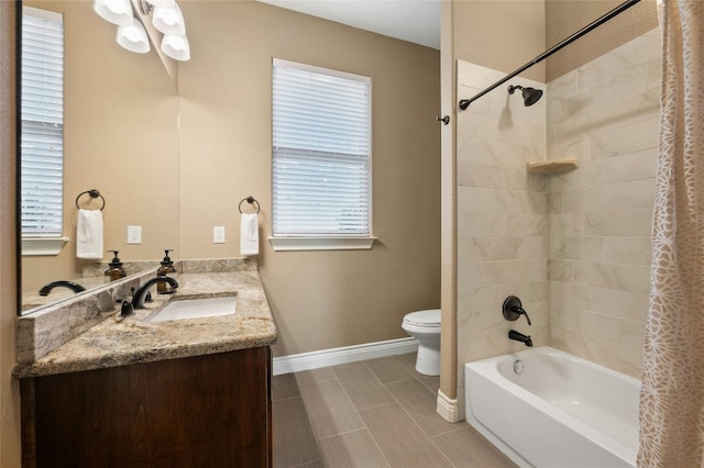 201 Greenridge Ln, Dripping Springs, TX 78620 - bathroom featuring toilet, vanity, shower / bathtub combination with curtain, baseboards, and tile patterned floors