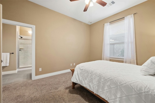 201 Greenridge Ln, Dripping Springs, TX 78620 - bedroom with baseboards, ensuite bath, ceiling fan, and carpet