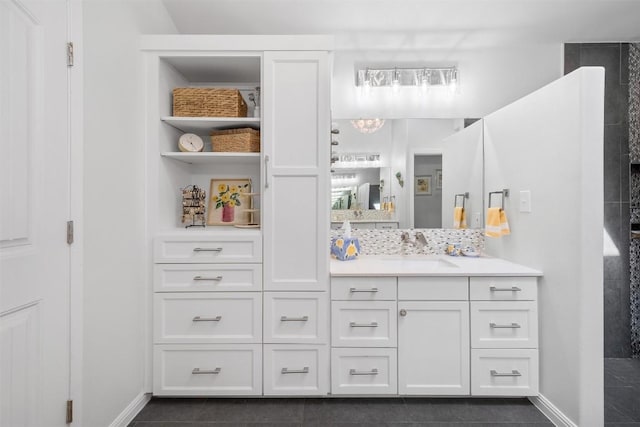 12519 Split Rail Pkwy, Austin, TX 78750 - full bath with vanity, tile patterned flooring, and backsplash