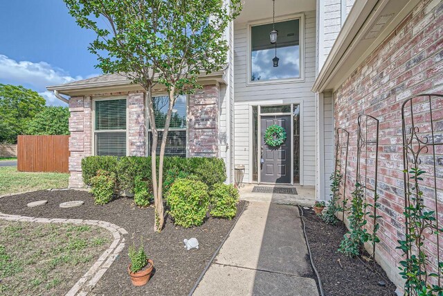 8660 Ephraim Rd, Austin, TX 78717 - doorway to property featuring brick siding