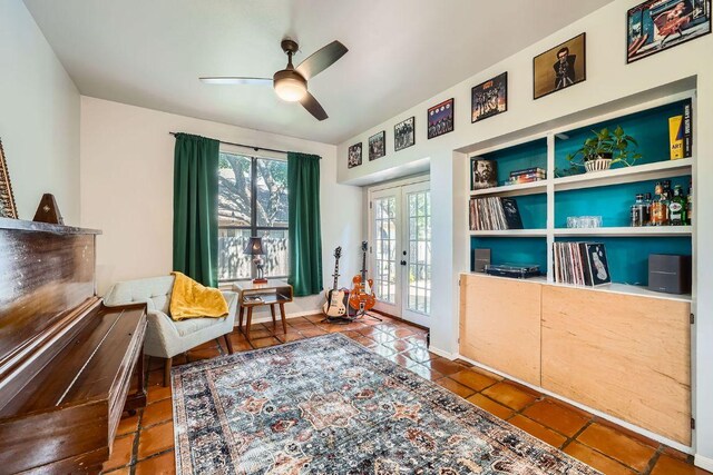 8660 Ephraim Rd, Austin, TX 78717 - sitting room featuring french doors, a ceiling fan, and tile patterned floors