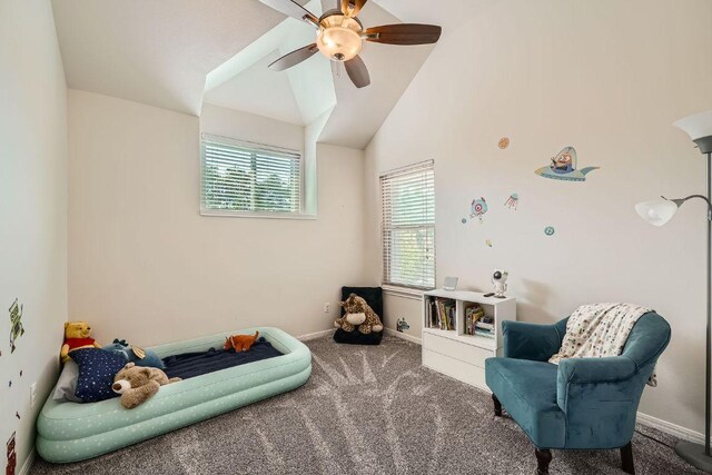 8660 Ephraim Rd, Austin, TX 78717 - living area with carpet, a ceiling fan, baseboards, and vaulted ceiling