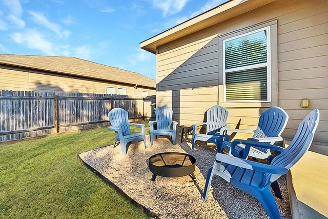 400 Westminster Dr, Kyle, TX 78640 - view of patio with an outdoor fire pit