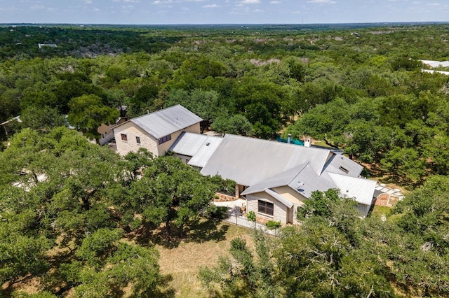 131 Camino Derecho, Wimberley, TX 78676 - view from above of property featuring a heavily wooded area