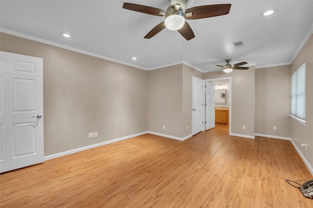 1009 Robertson Ave, Copperas Cove, TX 76522 - spare room featuring a ceiling fan, baseboards, light wood-style floors, ornamental molding, and recessed lighting
