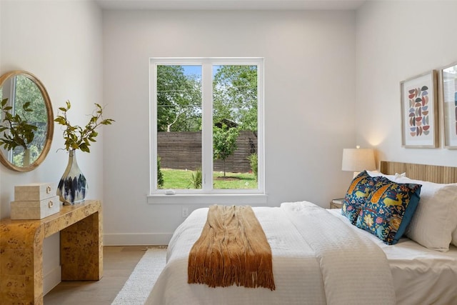4600 Parkdale Pl Unit 2, Austin, TX 78745 - bedroom with wood finished floors and baseboards