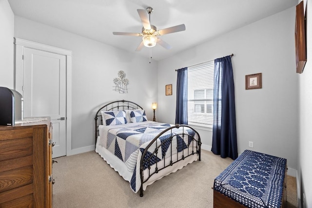 2208 Quarry Loop, Leander, TX 78641 - bedroom featuring light colored carpet and a ceiling fan