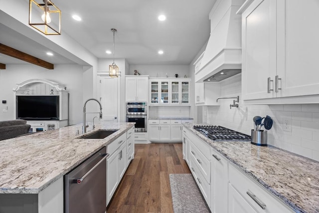 2208 Quarry Loop, Leander, TX 78641 - kitchen featuring stainless steel appliances, recessed lighting, custom exhaust hood, decorative backsplash, and white cabinetry