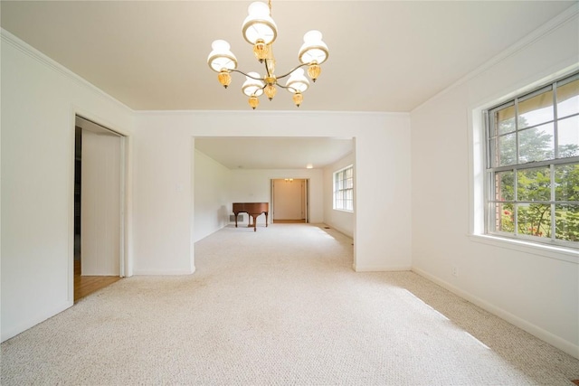 2208 US Highway 96 S, Center, TX 75935 - carpeted empty room with a chandelier and crown molding