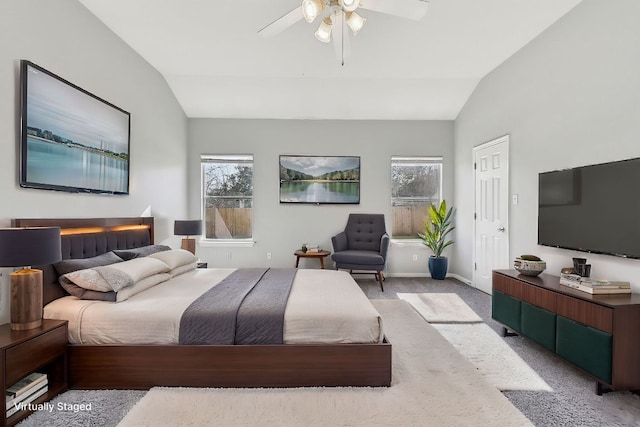 164 Ashwood S, Kyle, TX 78640 - carpeted bedroom featuring vaulted ceiling, baseboards, and ceiling fan
