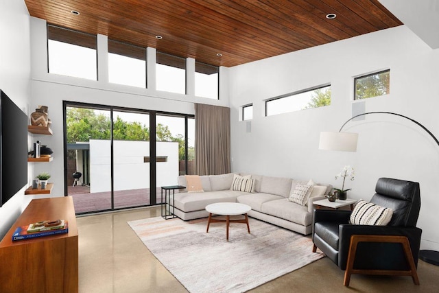 15206 General Williamson Dr, Austin, TX 78734 - living room featuring wooden ceiling, a towering ceiling, plenty of natural light, recessed lighting, and finished concrete flooring