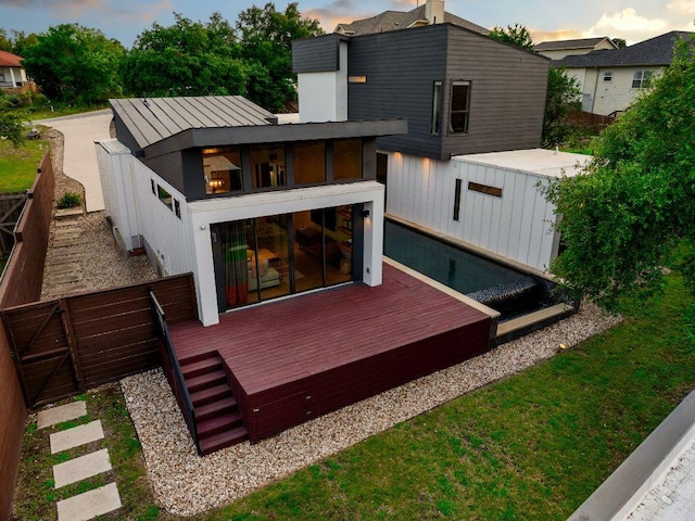 15206 General Williamson Dr, Austin, TX 78734 - back of house featuring a wooden deck and metal roof
