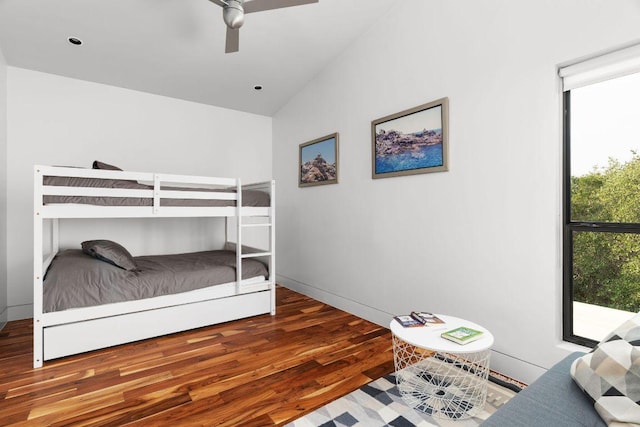 15206 General Williamson Dr, Austin, TX 78734 - bedroom featuring wood finished floors, lofted ceiling, a ceiling fan, and baseboards