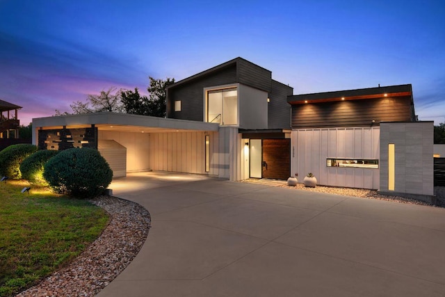 15206 General Williamson Dr, Austin, TX 78734 - contemporary house with concrete driveway and an attached carport