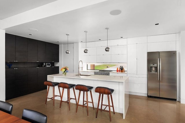 15206 General Williamson Dr, Austin, TX 78734 - kitchen with stainless steel refrigerator with ice dispenser, a sink, modern cabinets, light countertops, and recessed lighting