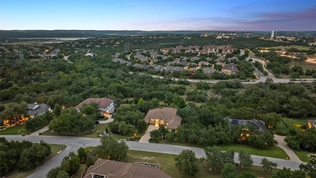 407 Bella Montagna Cir, Austin, TX 78734 - aerial view at dusk of a residential view