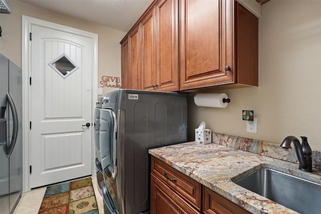 407 Bella Montagna Cir, Austin, TX 78734 - laundry area featuring cabinet space