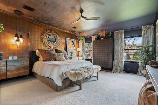 1102 Kinney Ave, Austin, TX 78704 - carpeted bedroom with multiple windows and ceiling fan