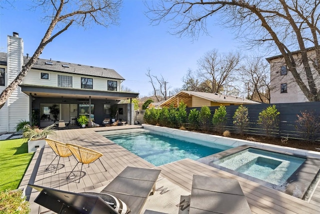 1102 Kinney Ave, Austin, TX 78704 - view of swimming pool with an in-ground hot tub, a fenced backyard, and a deck