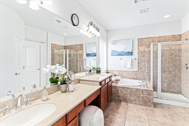 295 Desert Wilow Way, Austin, TX 78737 - bathroom featuring a stall shower, vanity, a bath, and tile patterned floors