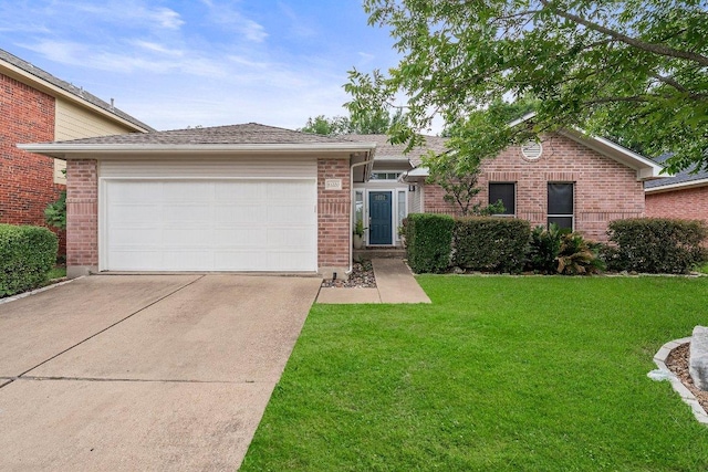 11220 Amaranth Ln, Austin, TX 78754 - ranch-style house with driveway, brick siding, a front yard, and an attached garage