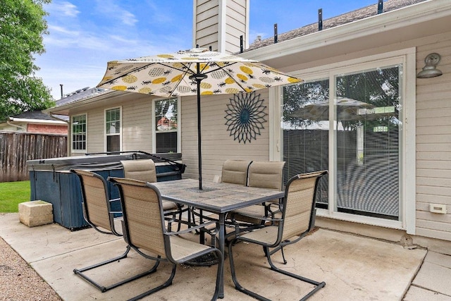 11220 Amaranth Ln, Austin, TX 78754 - view of patio with a hot tub and outdoor dining space